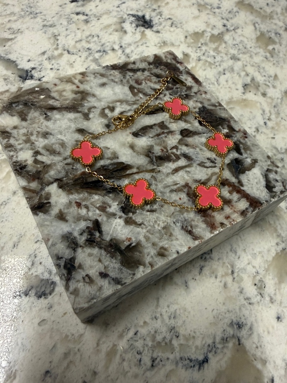 Gold-Tone Bracelet with Pink Clover Motifs